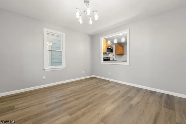 a view of an empty room with window