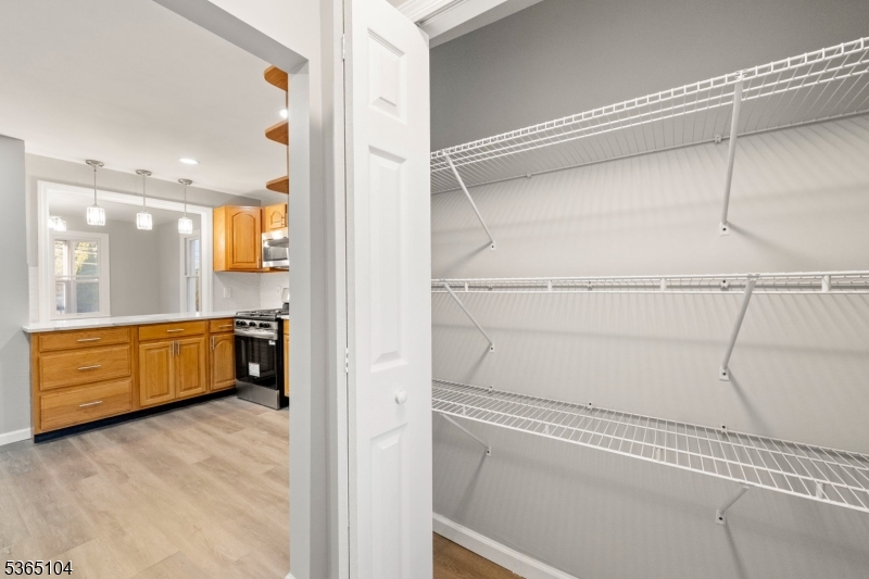 829 South 2nd Street Plainfield, NJ 07063 - Photo 9 of 23 a bathroom with a tub a sink and a large mirror