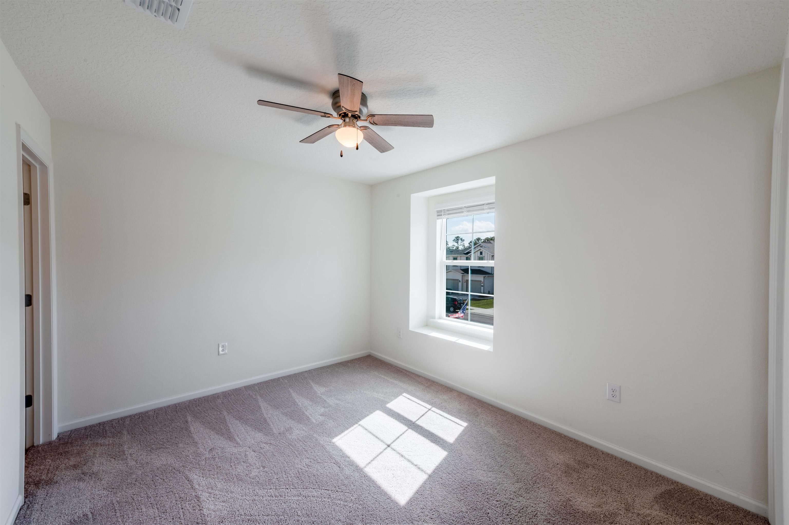 48 Mustard Hill St. Augustine, FL 32086 - Photo 16 of 28 a view of an empty room with a window