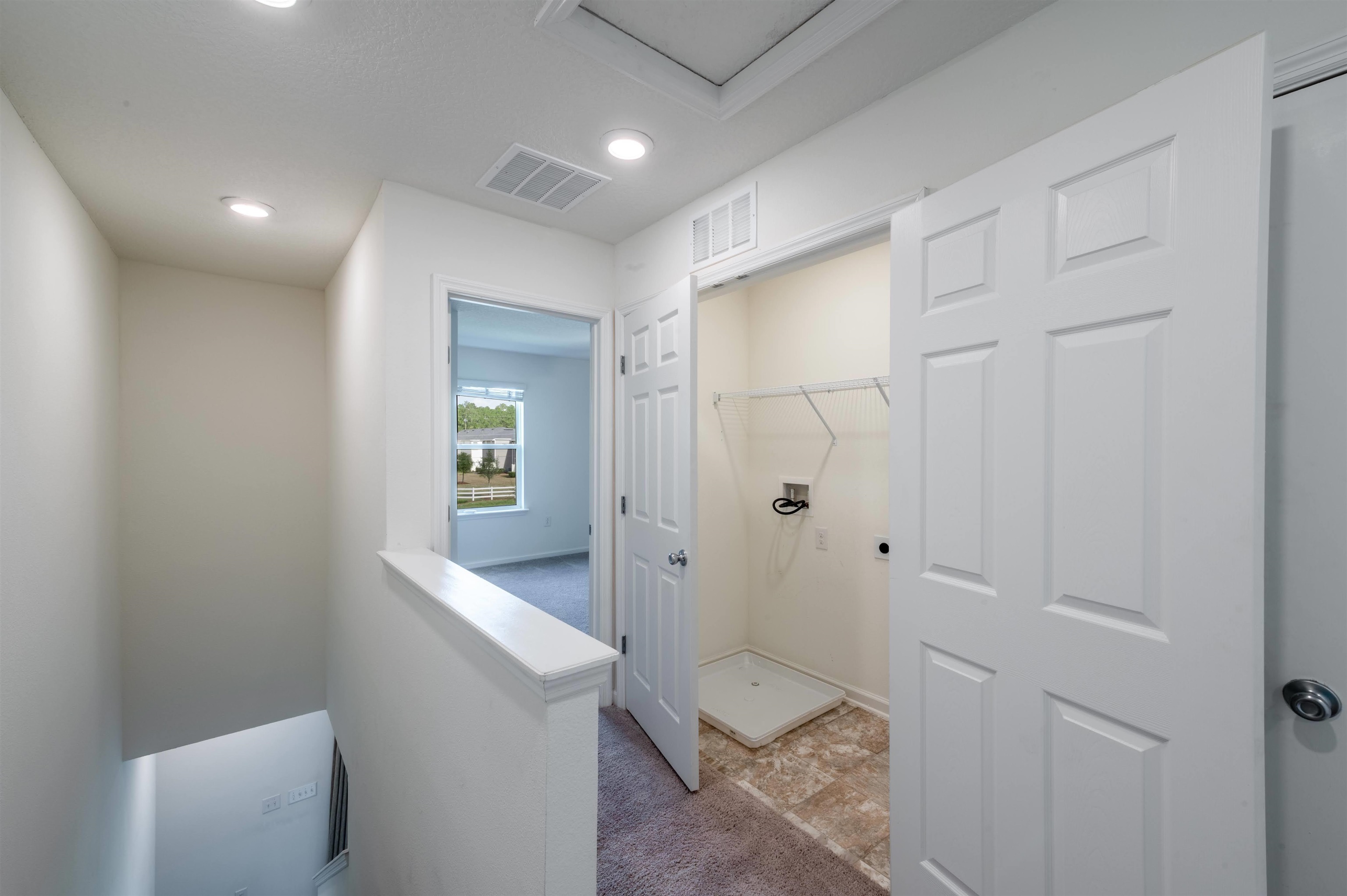 48 Mustard Hill St. Augustine, FL 32086 - Photo 21 of 28 a bathroom with a sink and mirror