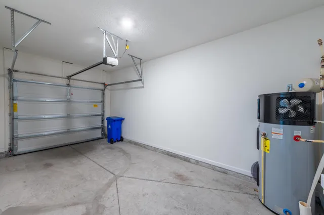 a view of a storage & utility room with a window