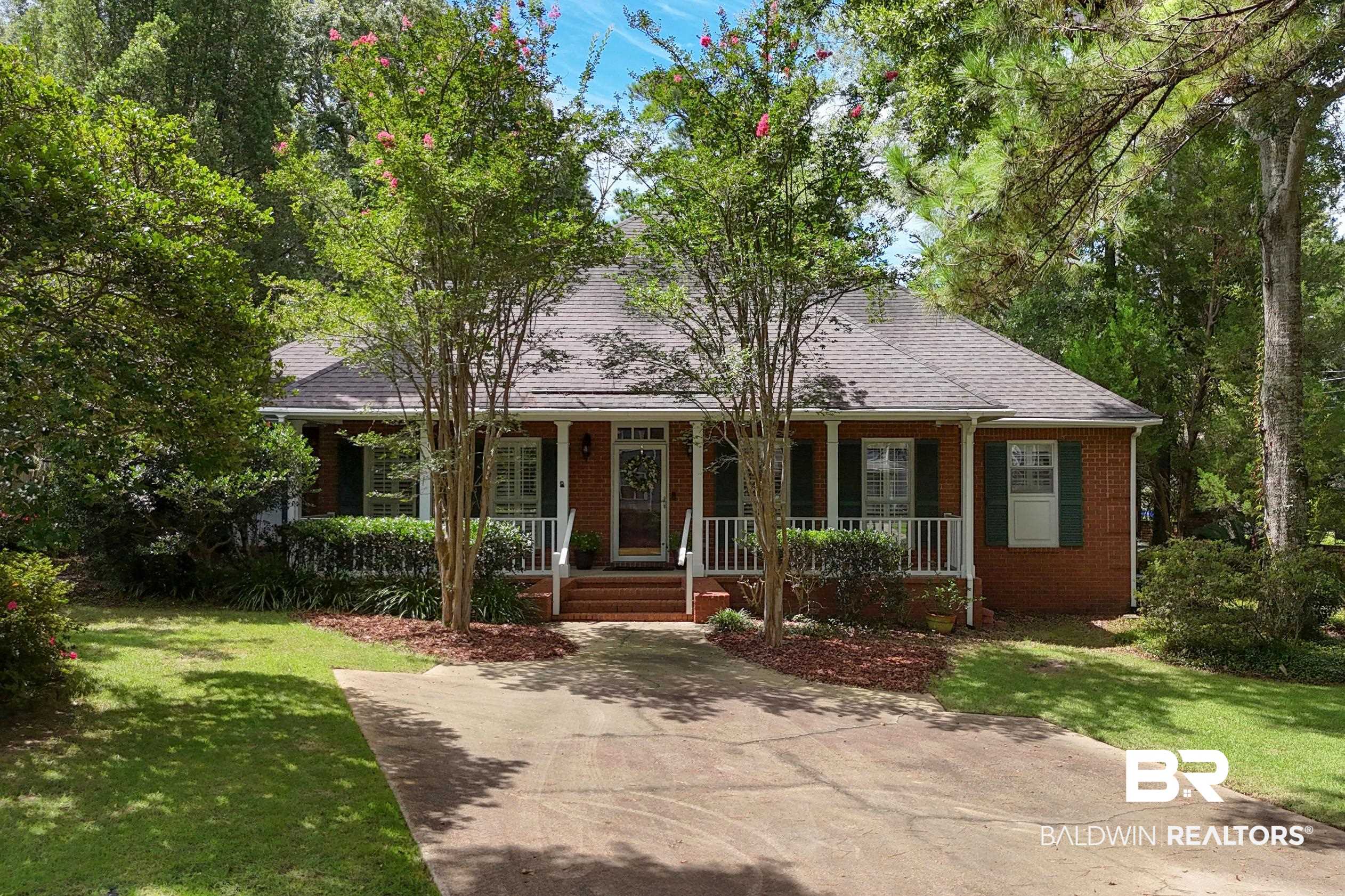 6638 Jackson Square Daphne, AL 36526 - Photo 50 of 62 View of front of home with a porch and a front yard