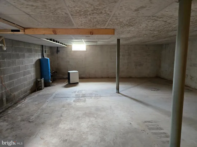 a view of a room with wooden wall