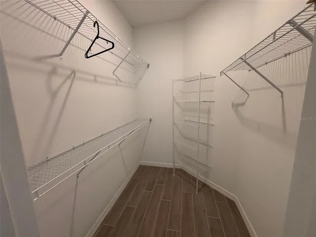 a view of a room with racks on the wall