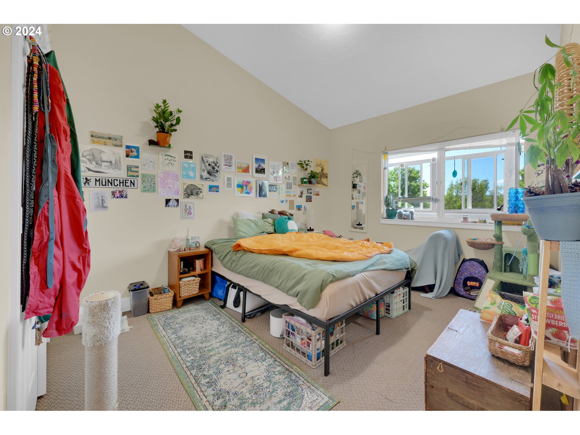 1857 Pearl Street Eugene, OR 97401 - Photo 28 of 45 a bedroom with a bed a dresser and a large mirror