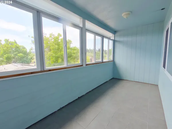 an empty room with a window