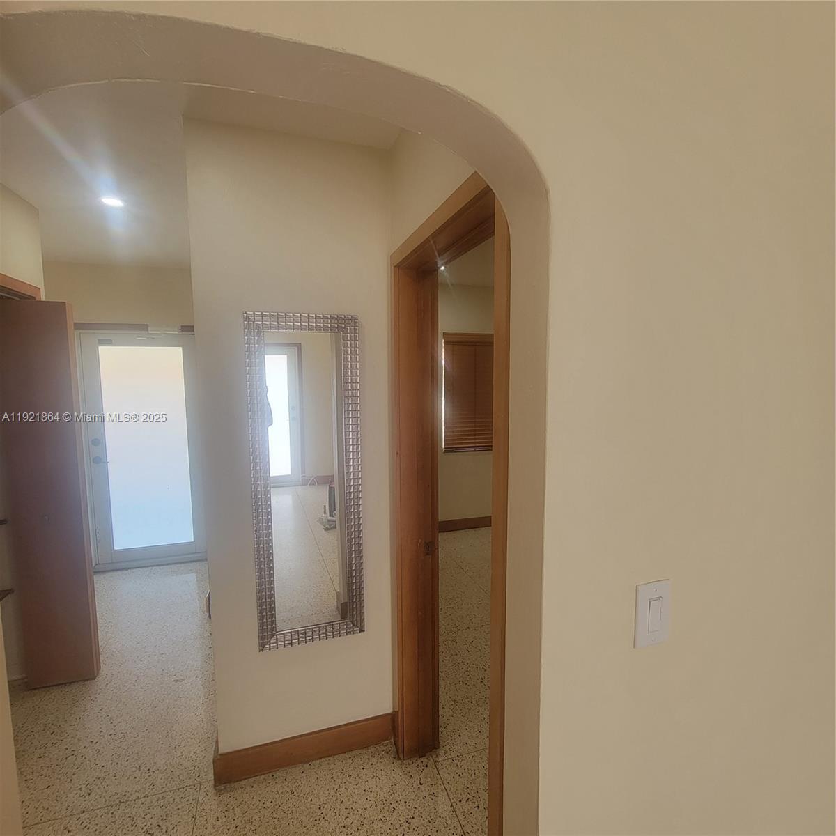 7400 Harding Avenue, Unit 15 Miami Beach, FL 33141 - Photo 11 of 29 a view of a hallway with front door