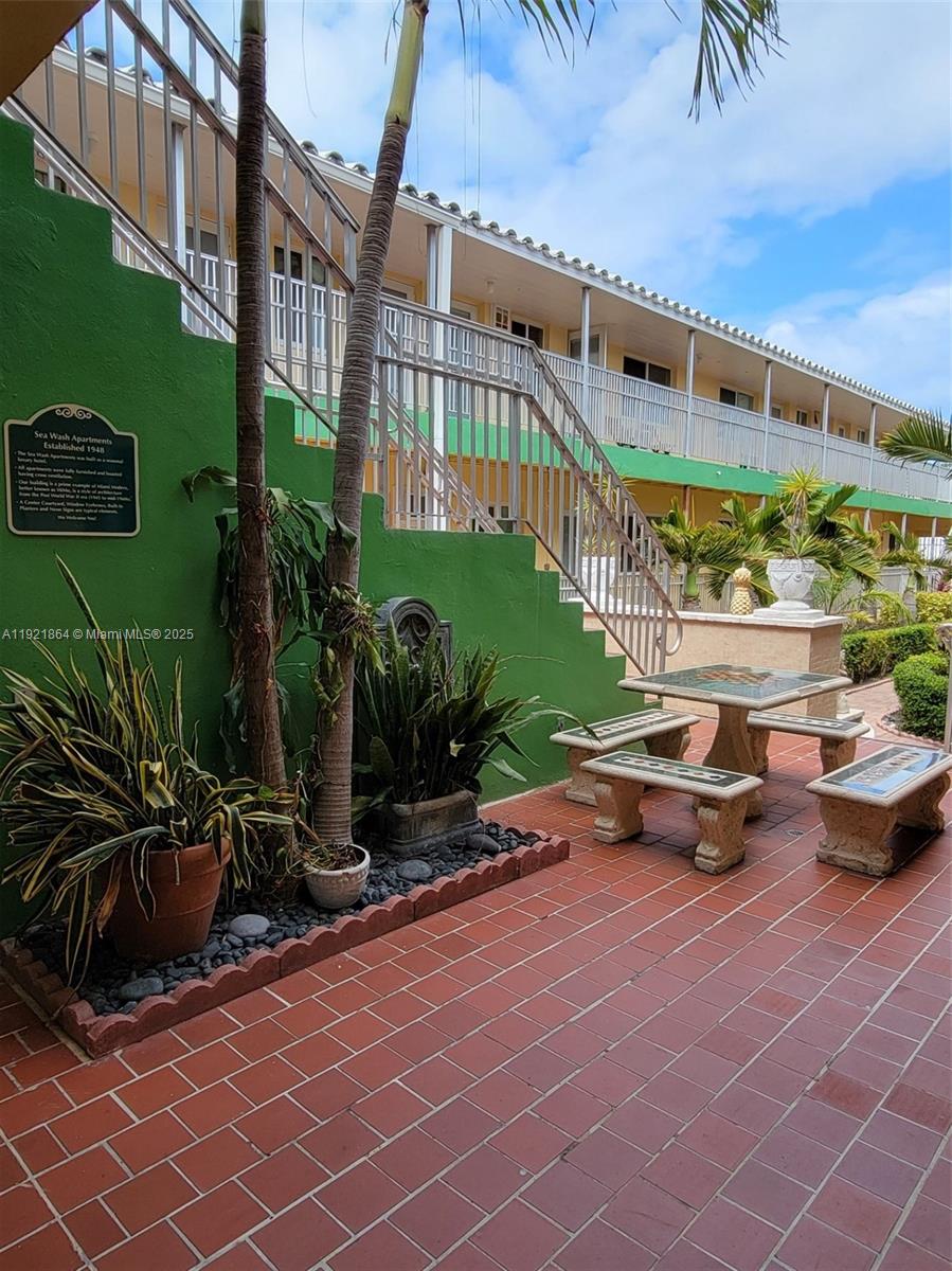 7400 Harding Avenue, Unit 15 Miami Beach, FL 33141 - Photo 27 of 29 an outdoor space with furniture