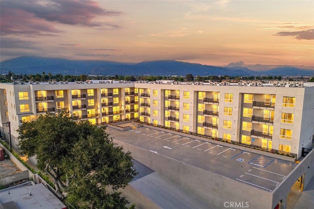 4064 Live Oak Avenue, Unit 208 Arcadia, CA 91006 - Photo 1 of 50 a view of multiple houses with a city street