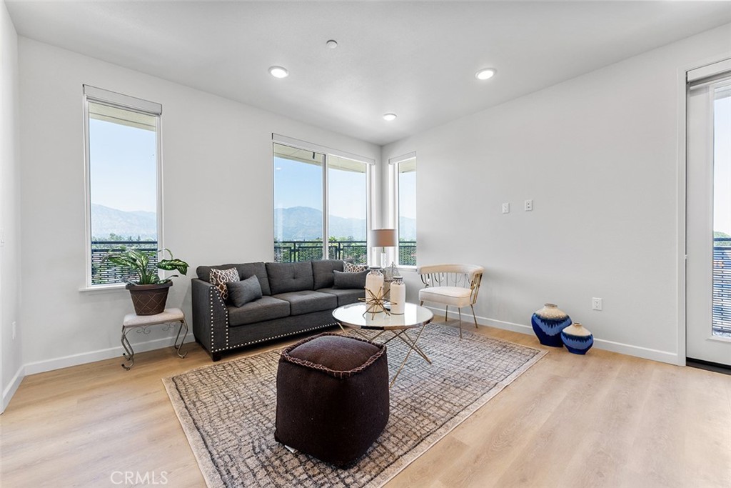 4064 Live Oak Avenue, Unit 208 Arcadia, CA 91006 - Photo 18 of 50 a living room with furniture and a potted plant