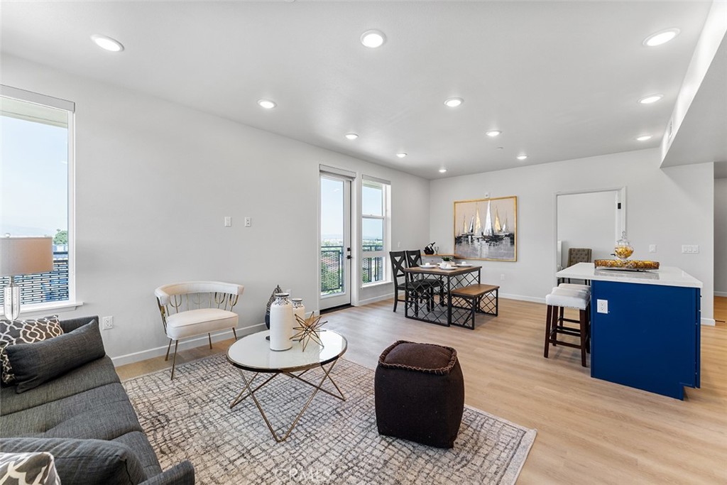 4064 Live Oak Avenue, Unit 208 Arcadia, CA 91006 - Photo 23 of 50 a living room with furniture and wooden floor