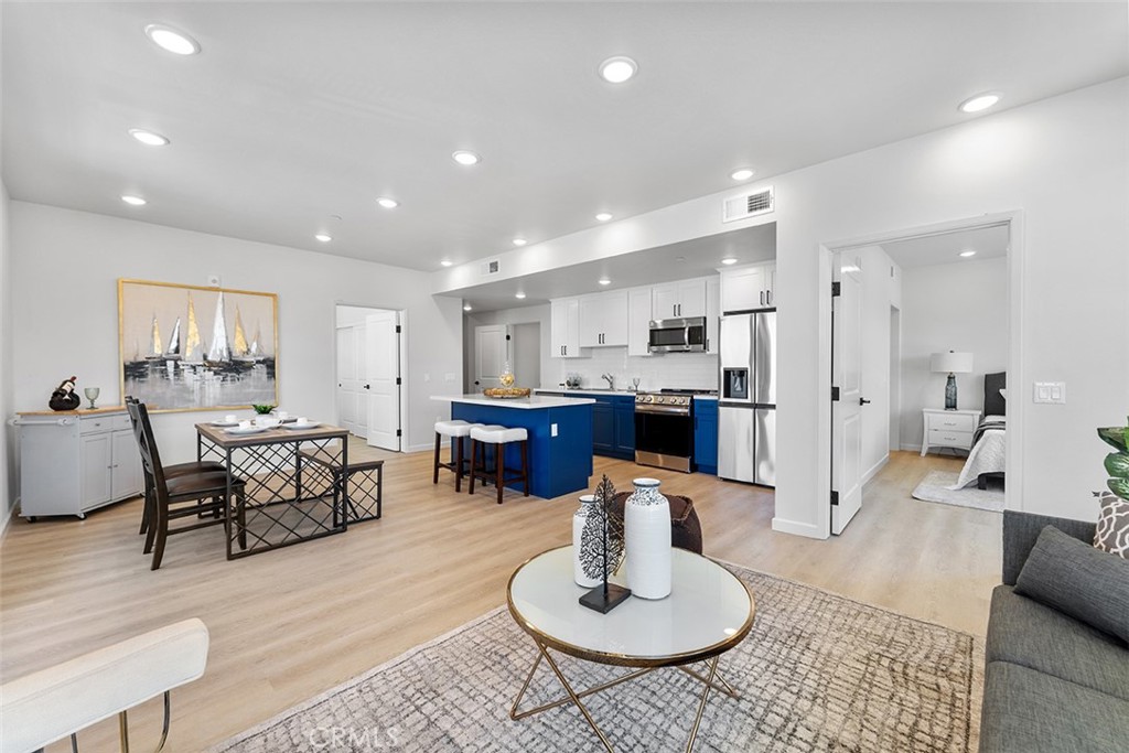 4064 Live Oak Avenue, Unit 208 Arcadia, CA 91006 - Photo 24 of 50 a living room with furniture and kitchen view