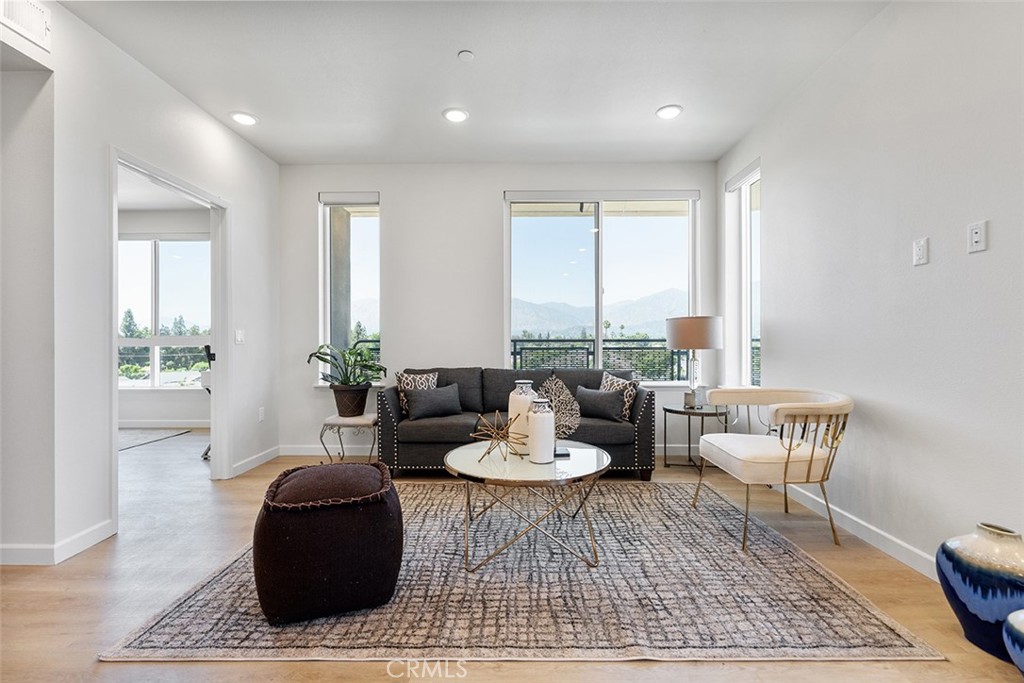 4064 Live Oak Avenue, Unit 208 Arcadia, CA 91006 - Photo 25 of 50 a living room with furniture and a rug