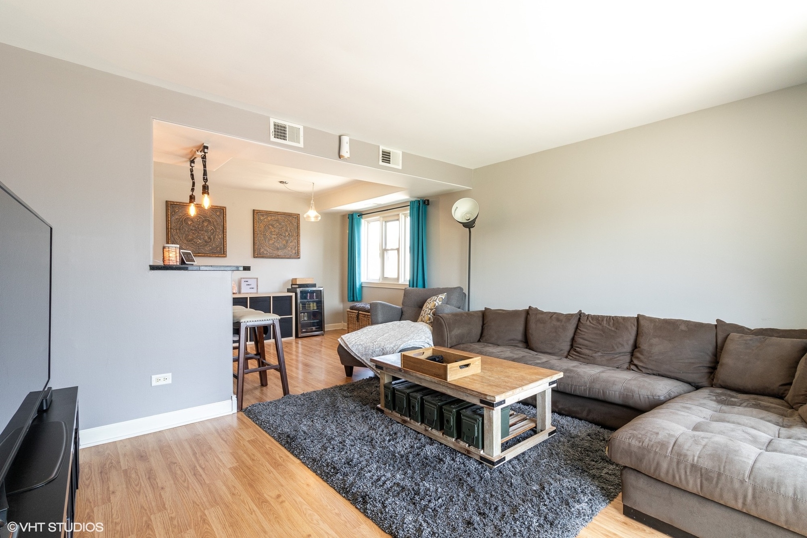 7033 Mather Avenue, Unit 2A Chicago Ridge, IL 60415 - Photo 3 of 10 a living room with furniture and wooden floor