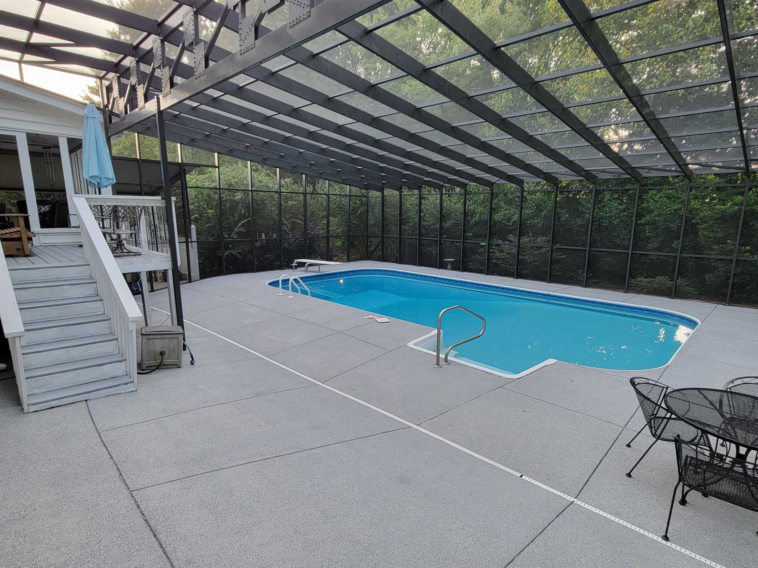 5924 Hampton Ridge Road Raleigh, NC 27603 - Photo 2 of 23 Entire pool deck and rear porch inside screened enclosure. private pool