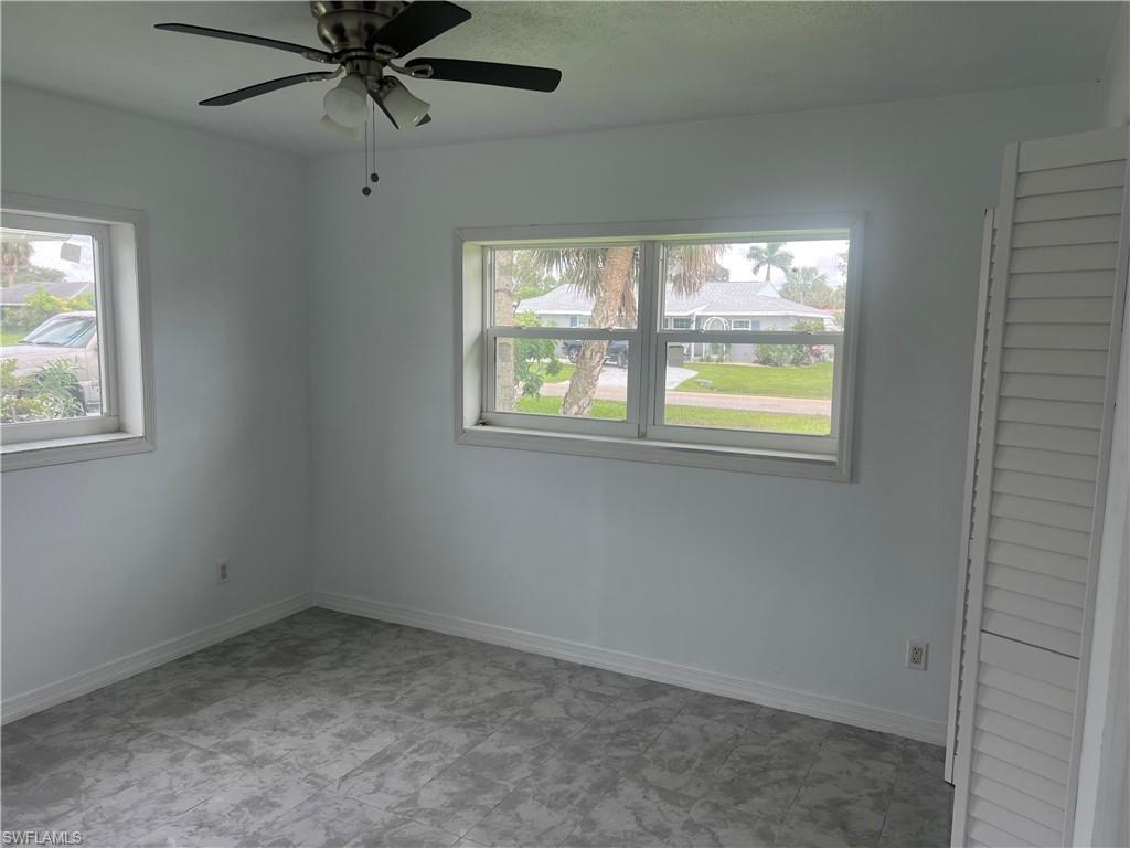 160 Brooks Road North Fort Myers, FL 33917 - Photo 13 of 19 an empty room with a window
