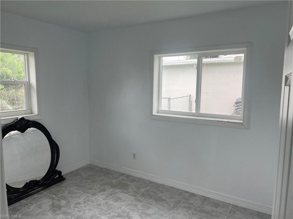 160 Brooks Road North Fort Myers, FL 33917 - Photo 15 of 19 an empty room with a window