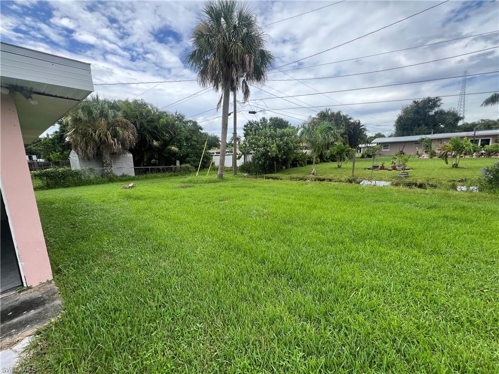 160 Brooks Road North Fort Myers, FL 33917 - Photo 19 of 19 a view of a backyard with a garden