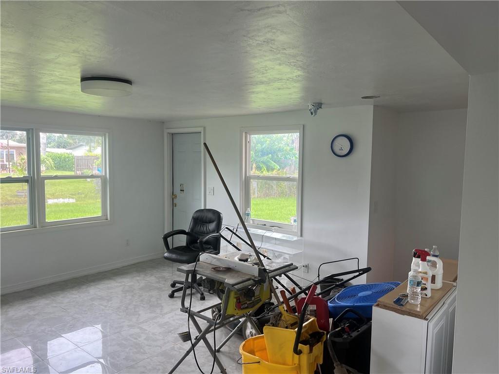 160 Brooks Road North Fort Myers, FL 33917 - Photo 6 of 19 a view of a workspace with furniture and a window