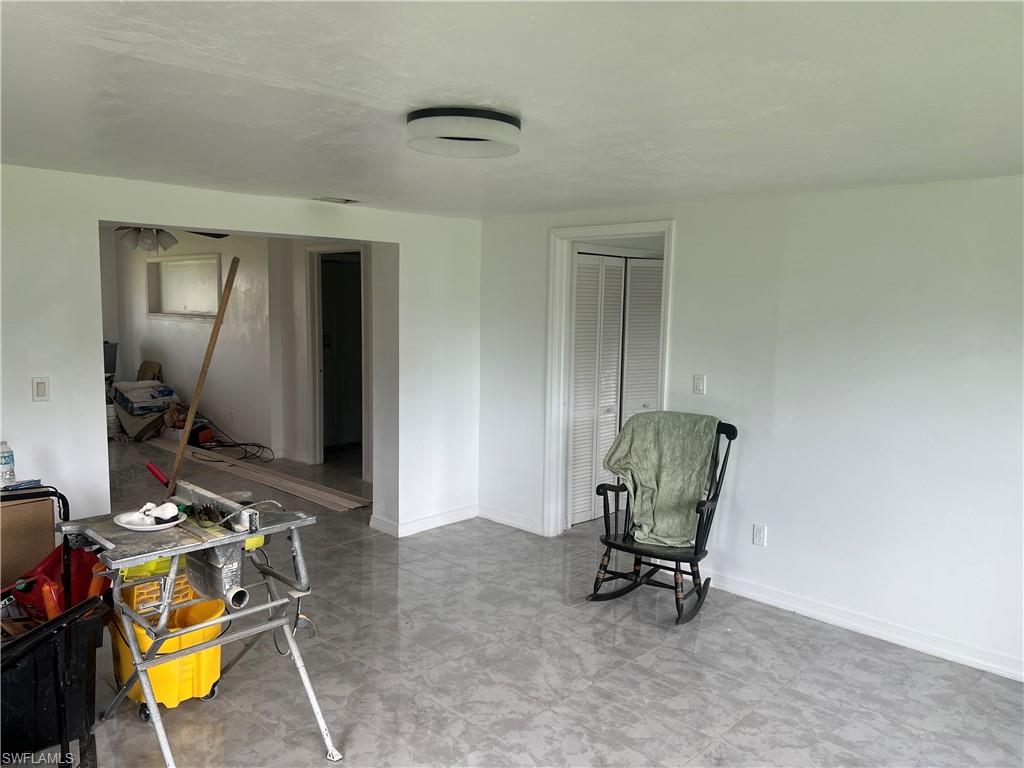 160 Brooks Road North Fort Myers, FL 33917 - Photo 7 of 19 a room with furniture and gym equipment