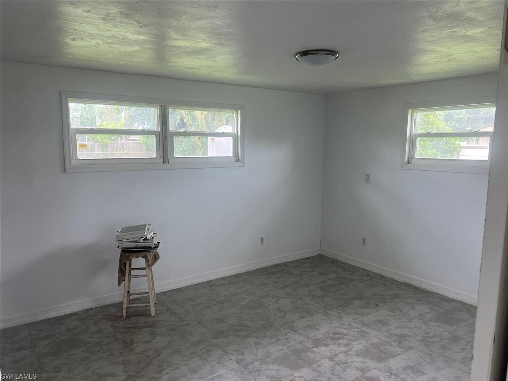 160 Brooks Road North Fort Myers, FL 33917 - Photo 8 of 19 a view of an empty room and window