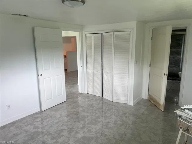 an empty room with closet