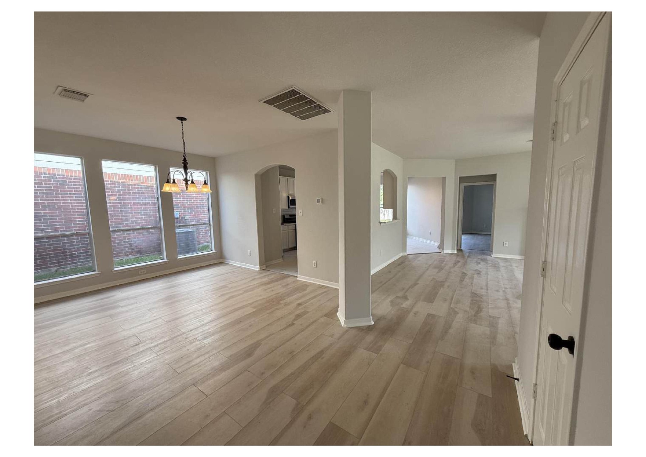 4106 Forest Rain Lane Atascocita, TX 77346 - Photo 19 of 49 a view interior of a house wooden floor and windows