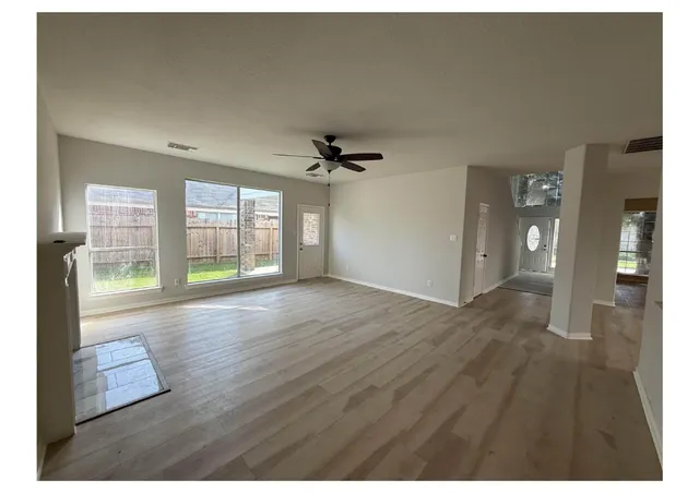 a view of an empty room and window