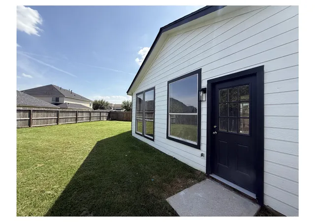 a view of outdoor space and yard