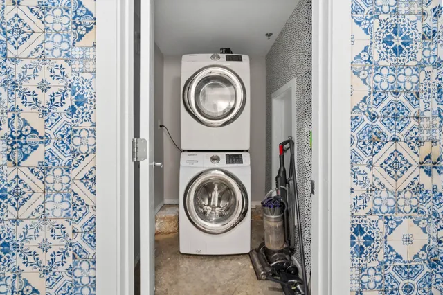 a view of washer and dryer in a utility room