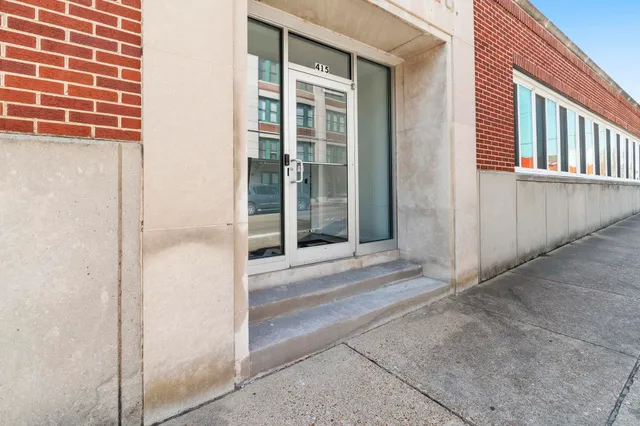 a view of a house with a door and a window