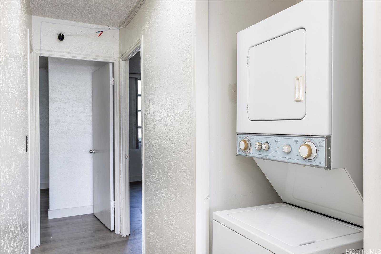 98-1030 Moanalua Road, Unit 5204 Aiea, HI 96701 - Photo 4 of 16 a utility room with dryer and washer