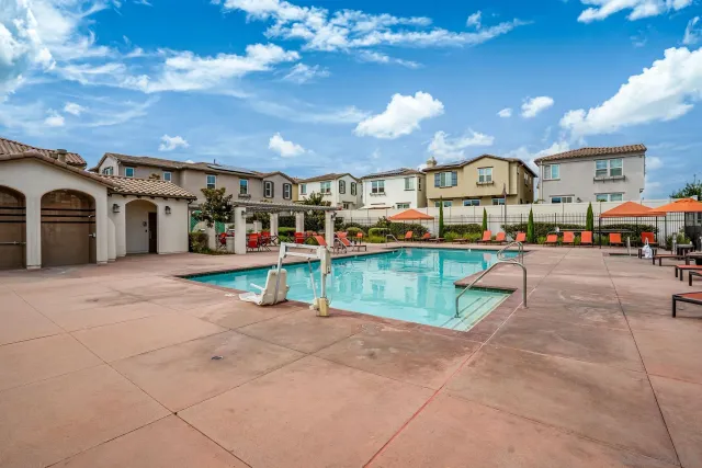 a view of a building with a yard