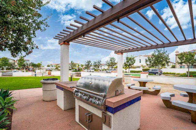 a view of a patio with a table chairs and a patio