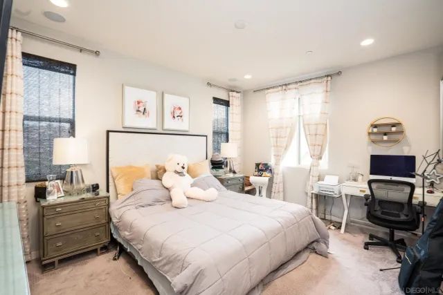 a bedroom with a bed and furniture