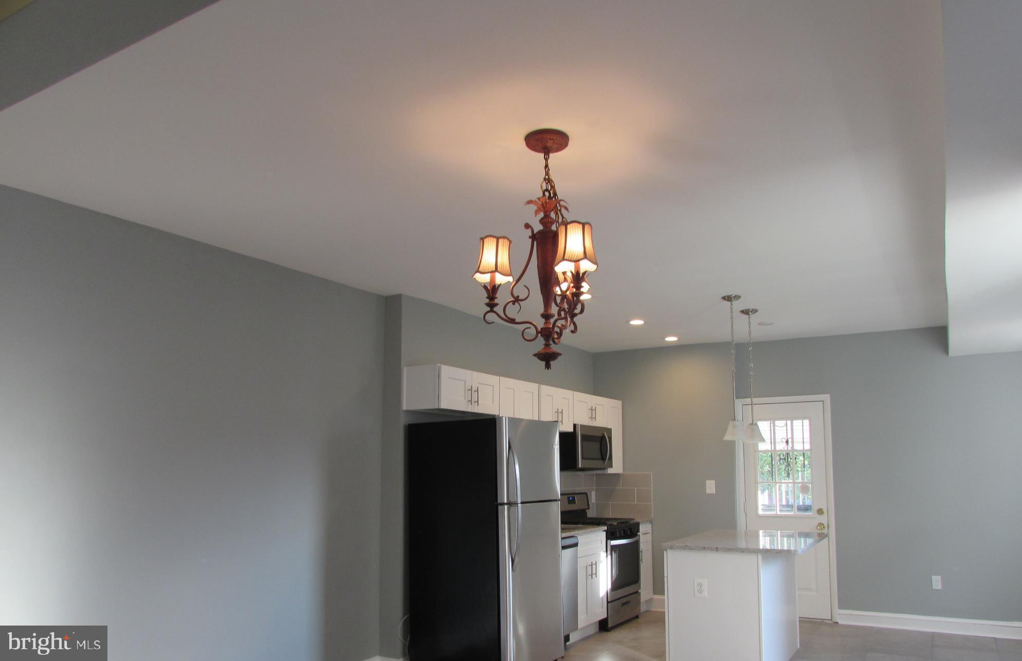 2735 Chesterfield Avenue Baltimore, MD 21213 - Photo 3 of 30 ALL NEW APPLIANCES- GRANITE ISLAND- NATURAL LIGHT