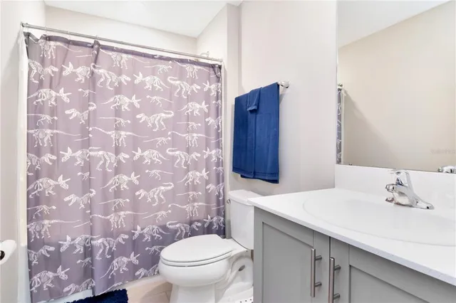 a swimming pool with lots of tress in the background