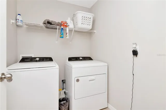 a view of a backyard with swings