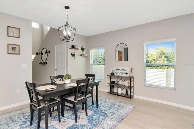 a view of a dining room with furniture