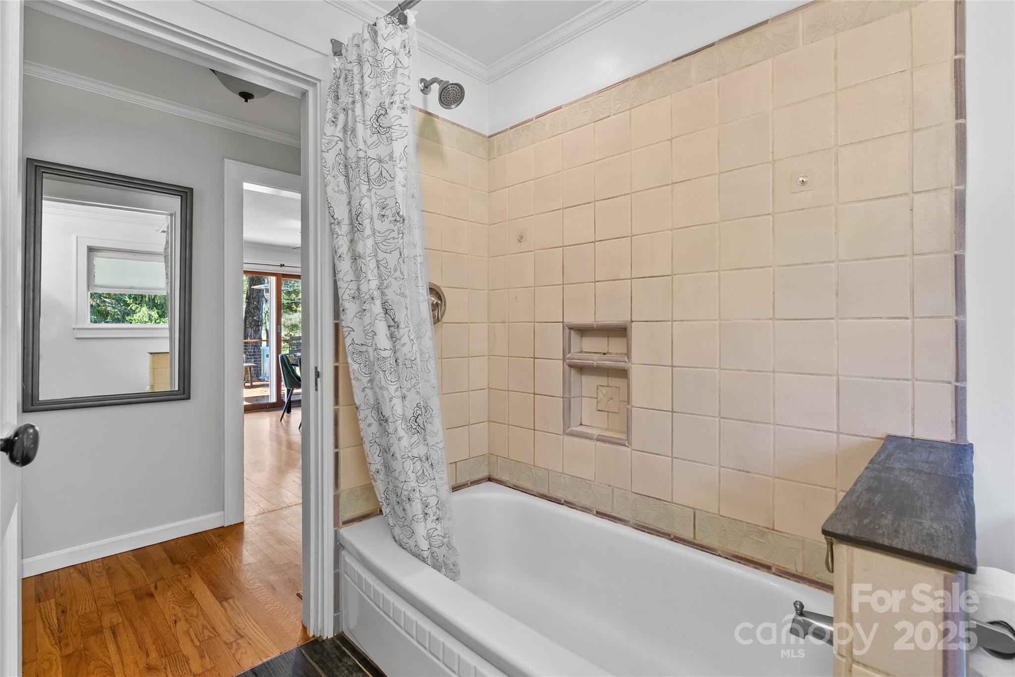 175 Candler School Road Candler, NC 28715 - Photo 15 of 37 a bathroom with a tub shower and sink