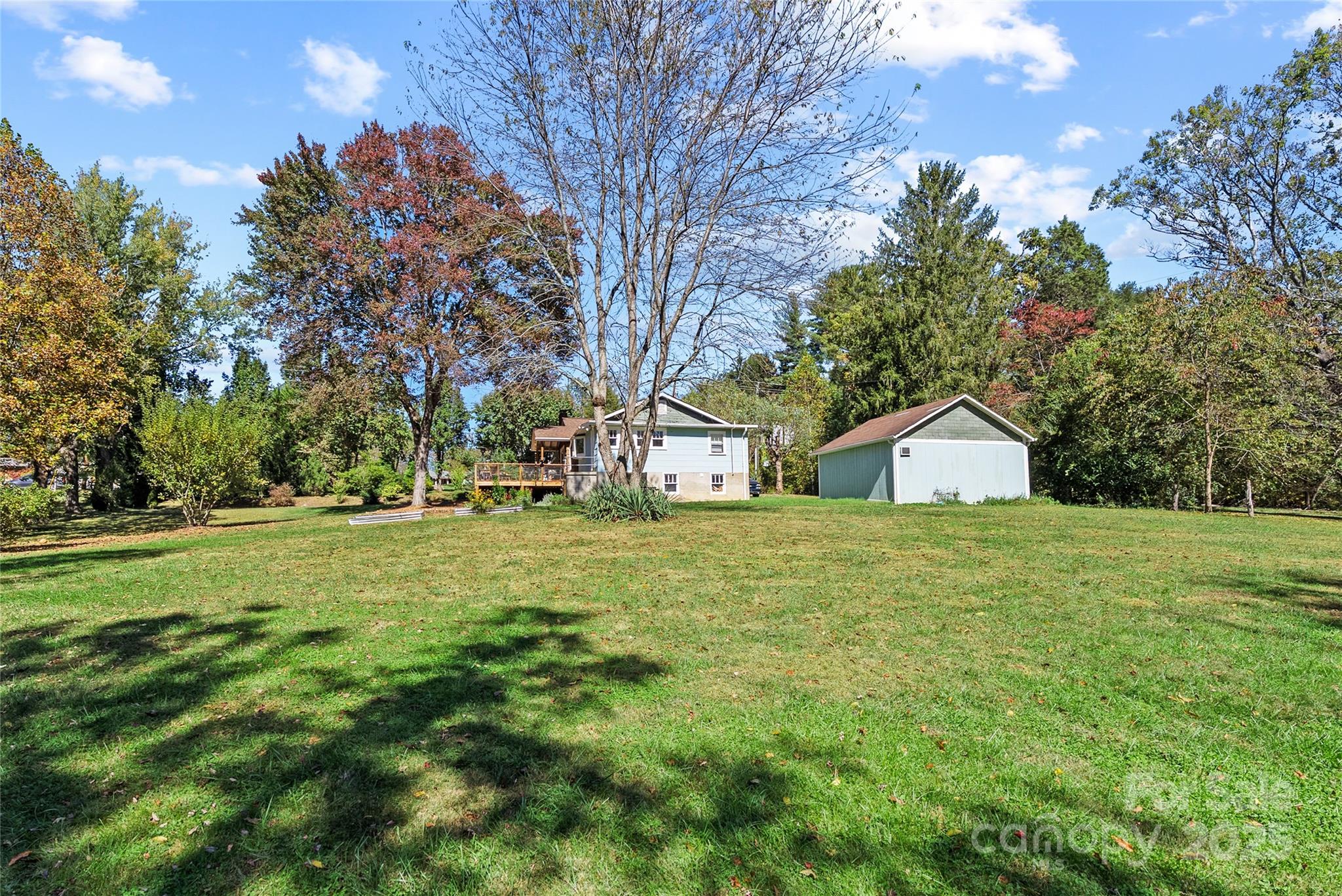 175 Candler School Road Candler, NC 28715 - Photo 33 of 37 a view of a big yard with large trees