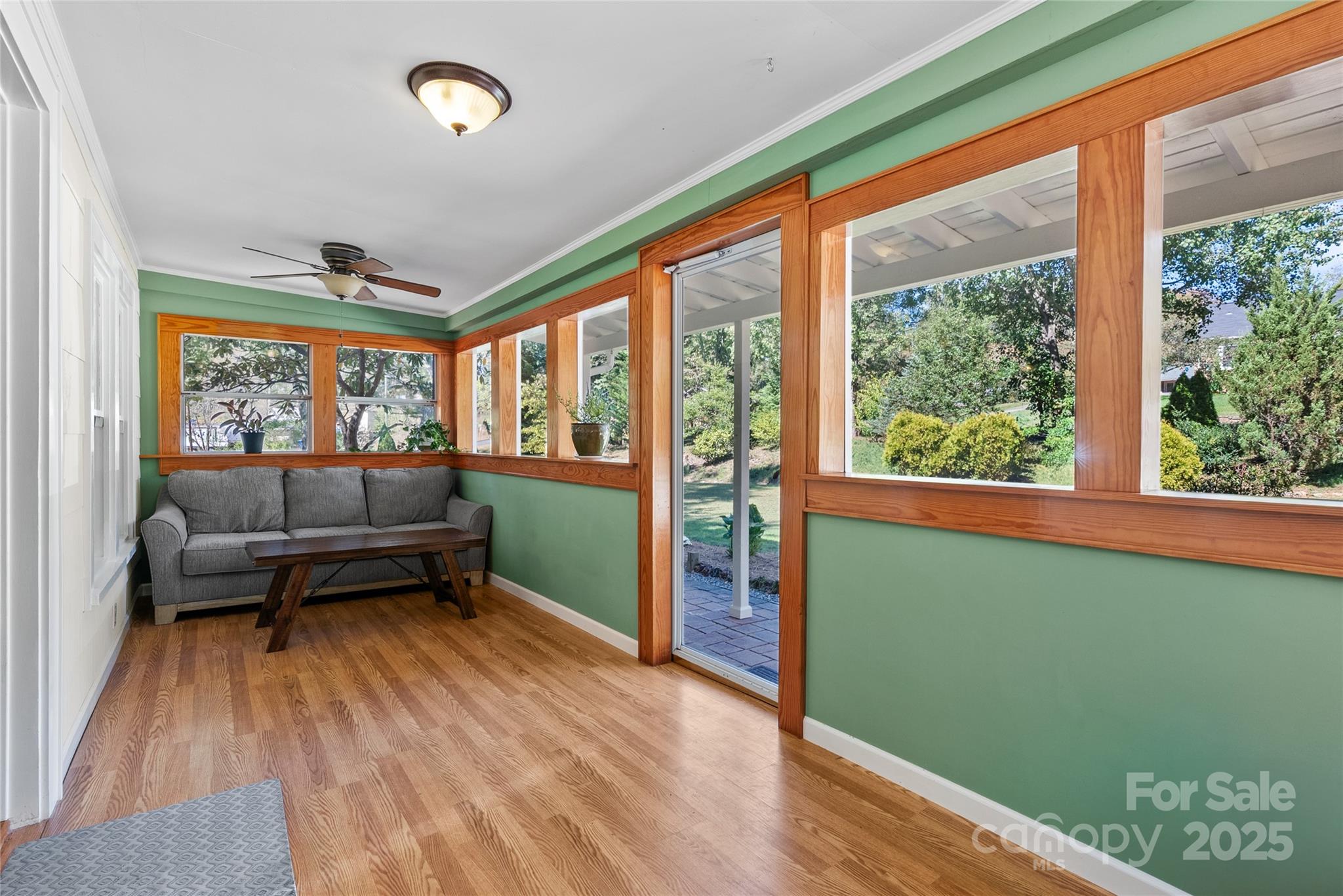 175 Candler School Road Candler, NC 28715 - Photo 5 of 37 a living room with furniture and a large window