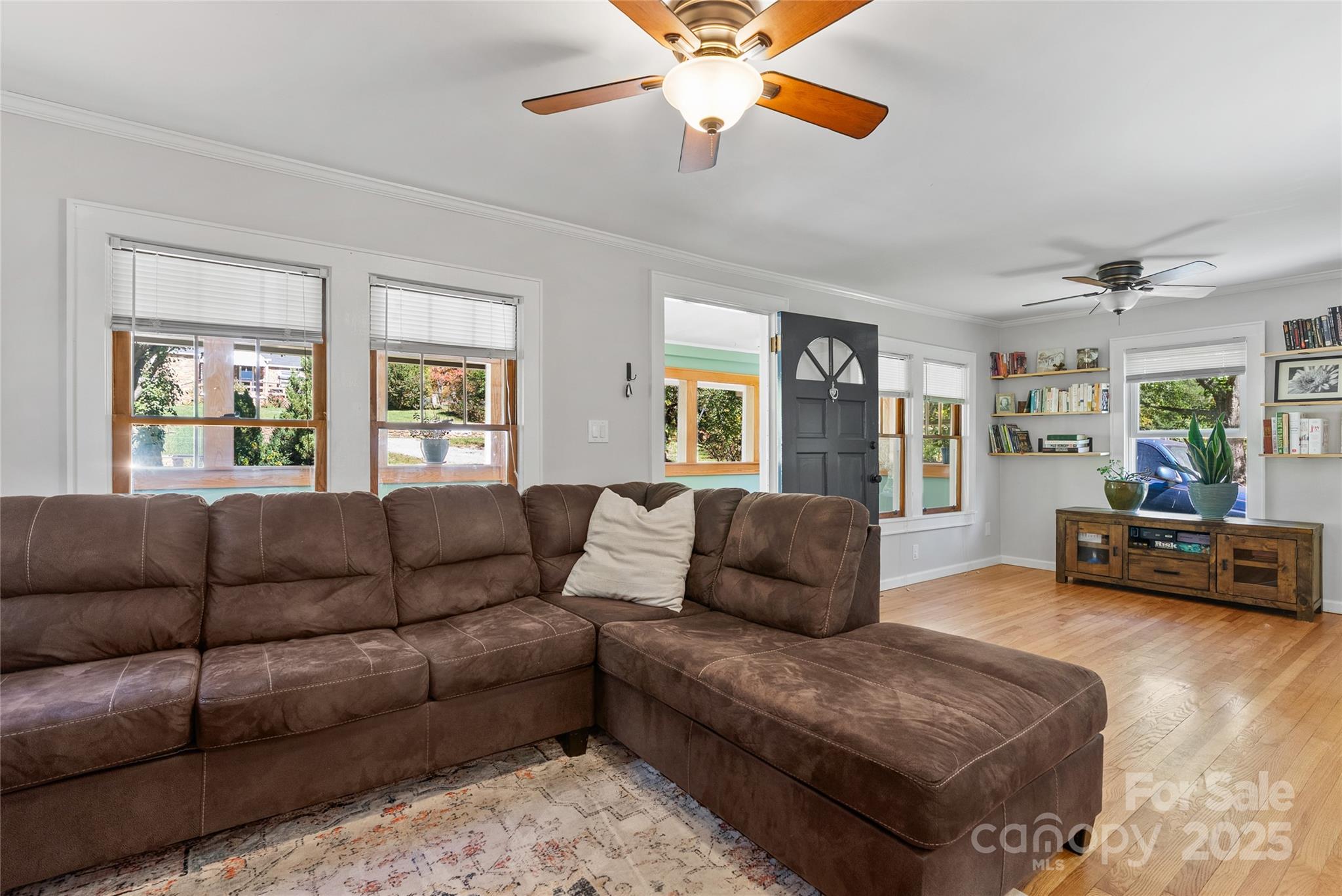 175 Candler School Road Candler, NC 28715 - Photo 8 of 37 a living room with furniture and a window