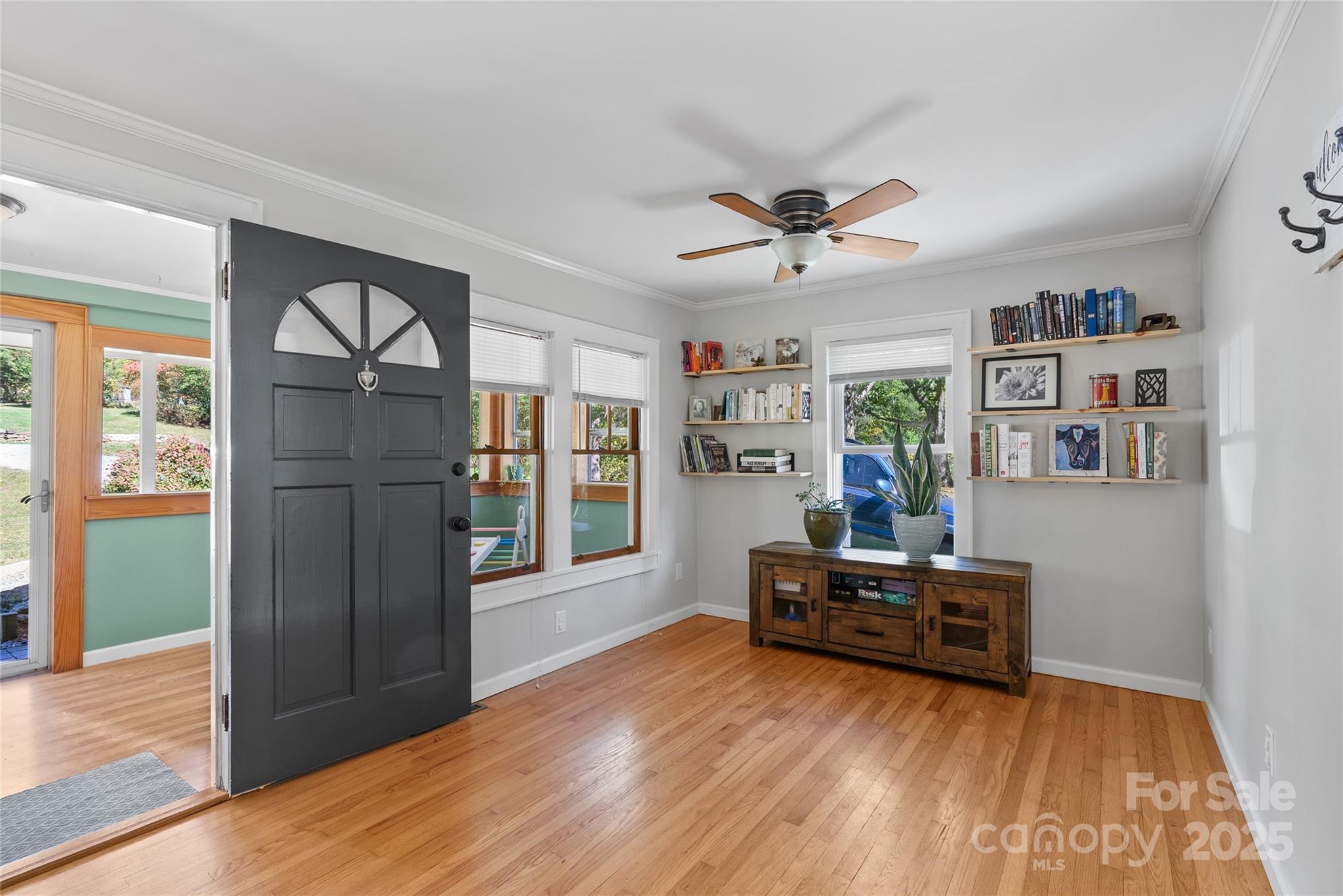 175 Candler School Road Candler, NC 28715 - Photo 9 of 37 a living room with furniture and a window