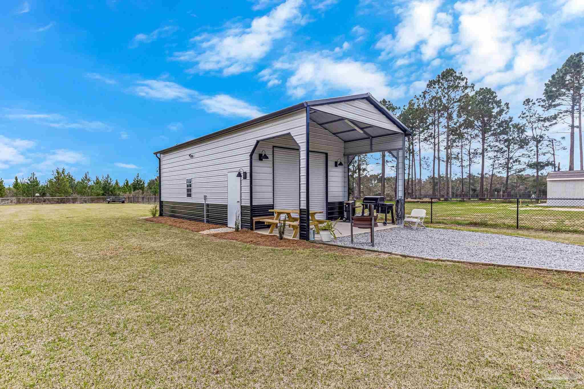 7612 Dewey Jernigan Road Pace, FL 32571 - Photo 2 of 36