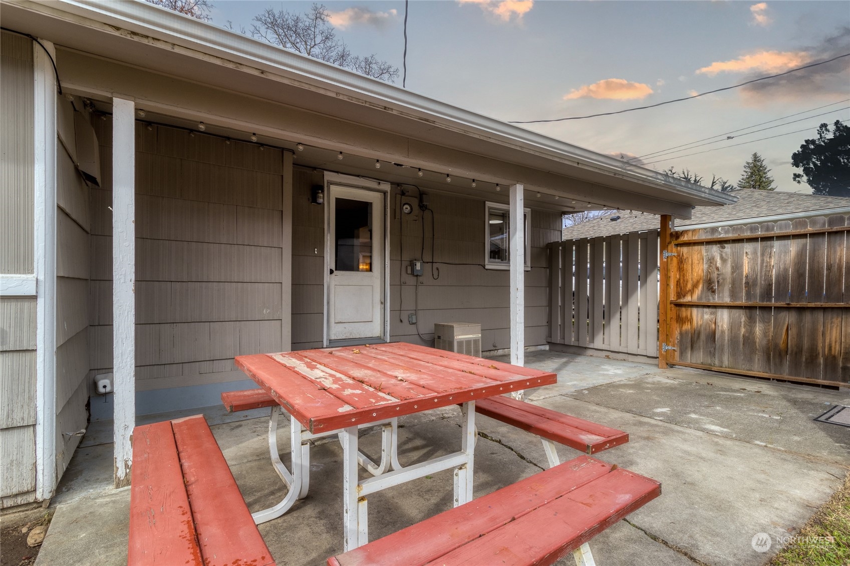 1055 St John Walla Walla, WA 99362 - Photo 19 of 27 a backyard of a house with barbeque oven table and chairs