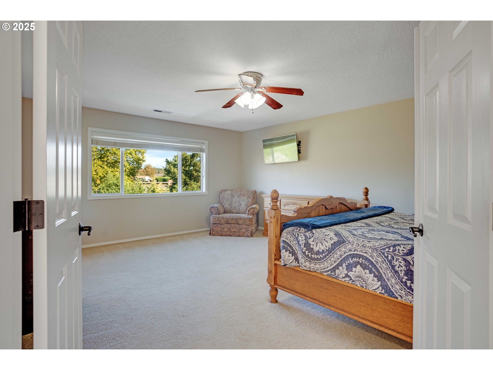 20194 Canyon Ridge Drive Oregon City, OR 97045 - Photo 13 of 41 a bedroom with furniture and a window