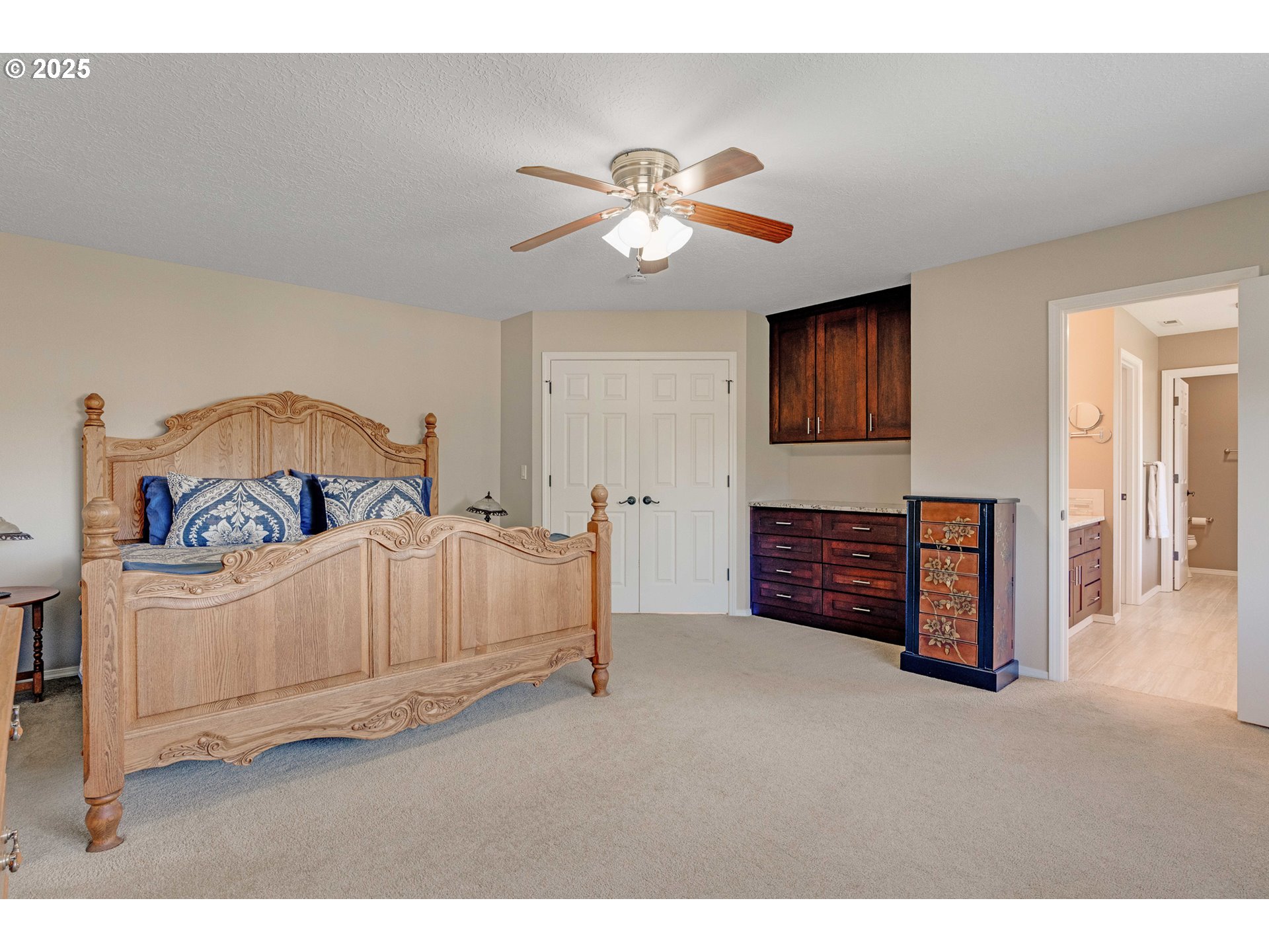 20194 Canyon Ridge Drive Oregon City, OR 97045 - Photo 14 of 41 a bedroom with furniture and a chandelier