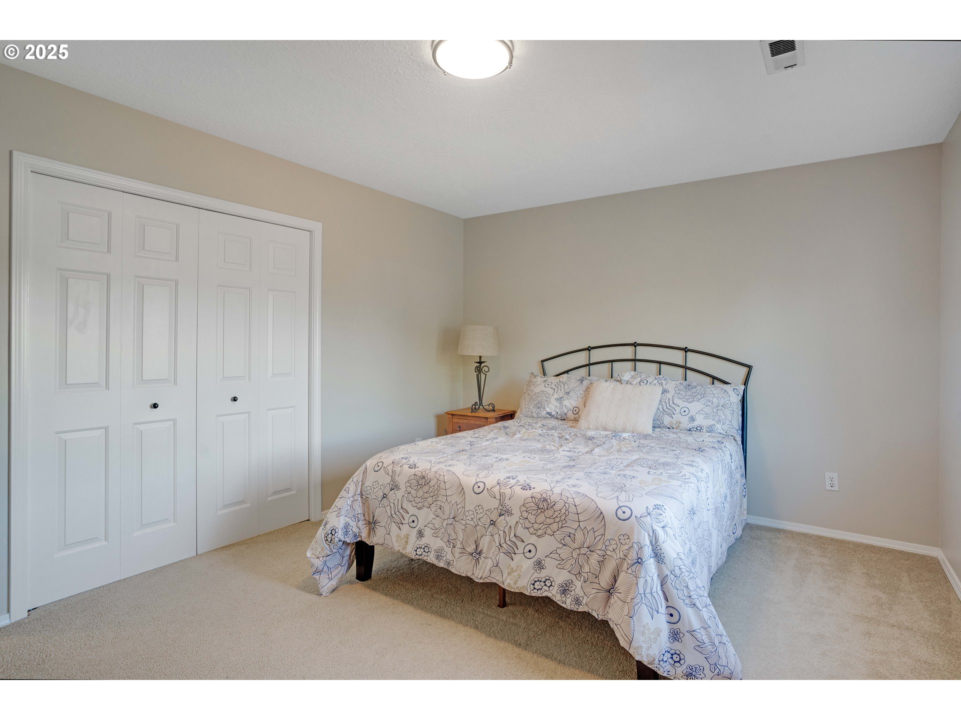 20194 Canyon Ridge Drive Oregon City, OR 97045 - Photo 21 of 41 a bedroom with a bed and a table