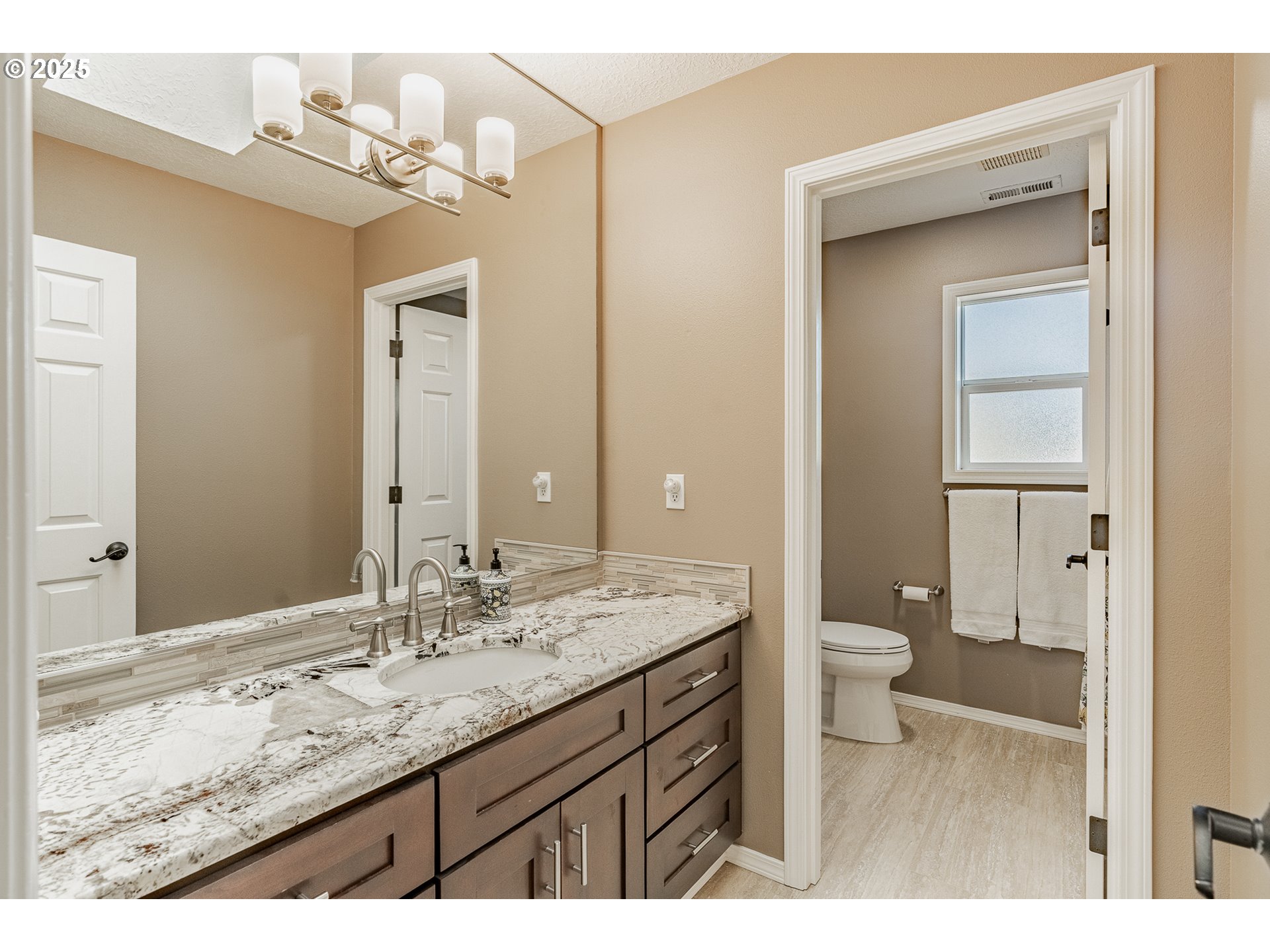 20194 Canyon Ridge Drive Oregon City, OR 97045 - Photo 22 of 41 a bathroom with a granite countertop sink toilet and shower